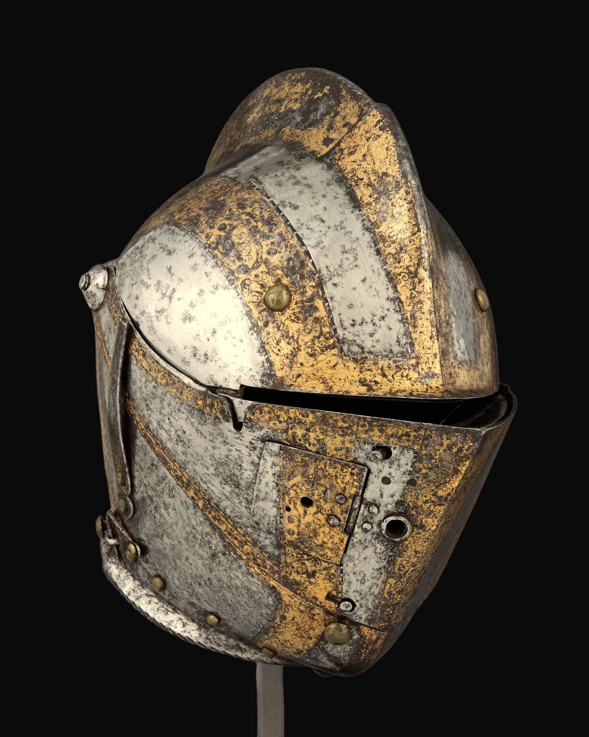 Close helmet for the tilt, German, Augsburg, 1573, steel with gold and brass (The Met)